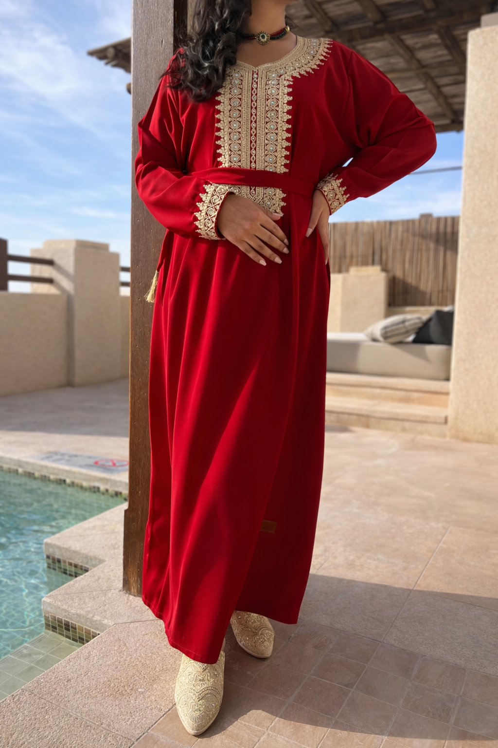 Experience the ultimate signature of timeless luxury. The Moonlit Noir kaftan is crafted from a fluid, matte black fabric that creates a dramatic canvas for our artisanal gold embroidery. A majestic silhouette designed for a powerful and graceful presence.