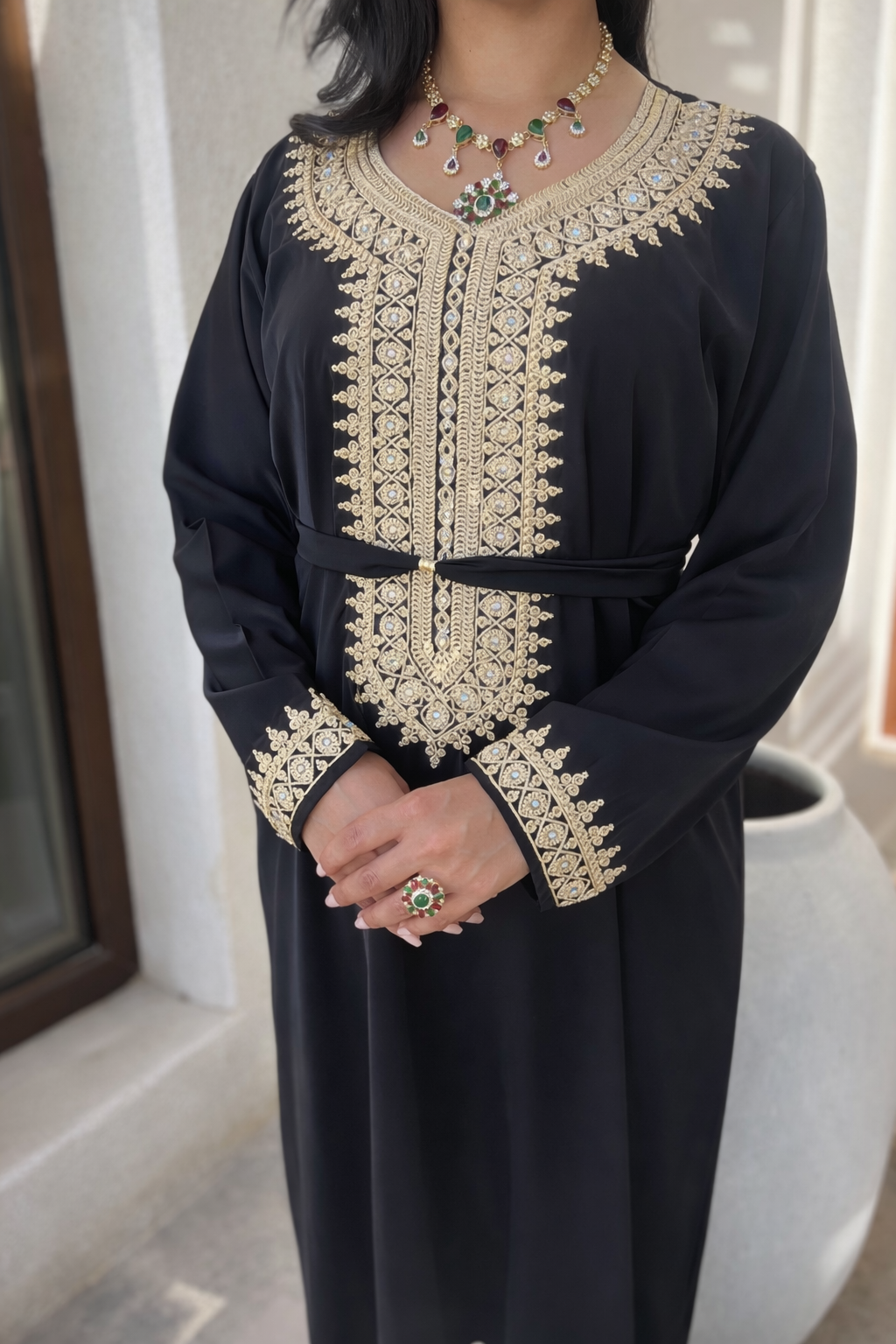 Full length view of the Maison Nelya Midnight Heritage Kaftan with central gold embroidery panel.